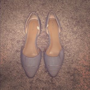 Black and white pointed flats